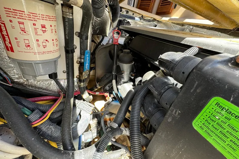 Point Aft'r Yacht Photos Pics Engine compartment of 2012 Ranger Tugs R-29, showcasing wiring and components.