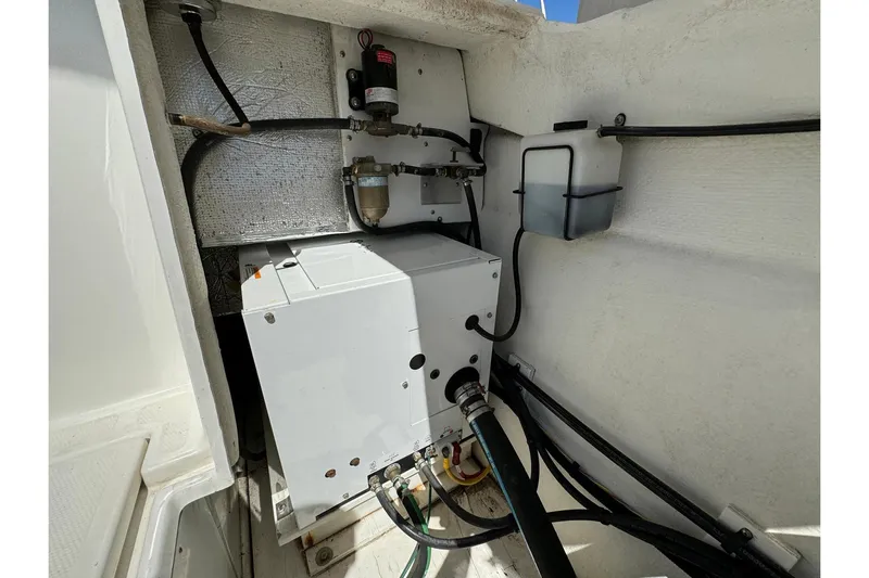 Point Aft'r Yacht Photos Pics Engine compartment of 2012 Ranger Tugs R-29 with mechanical components and wiring.