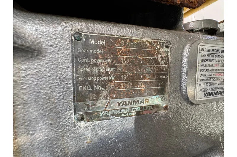 Point Aft'r Yacht Photos Pics Yanmar engine plate on a 2012 Ranger Tugs R-29 boat, showing specifications and compliance details.