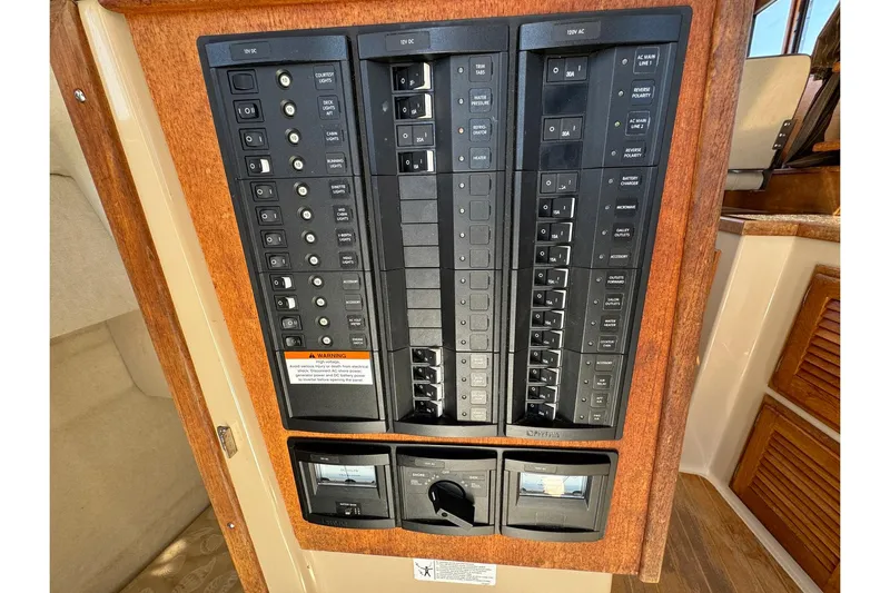 Point Aft'r Yacht Photos Pics Electrical panel of 2012 Ranger Tugs R-29 boat with switches and controls.