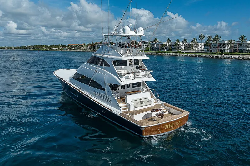 Bella Yacht Photos Pics 2018 Viking 92 Sky Bridge yacht cruising on a sunny day.