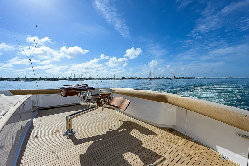 Bella Yacht Photos Pics 2018 Viking 92 Sky Bridge yacht deck with ocean view and clear blue sky.