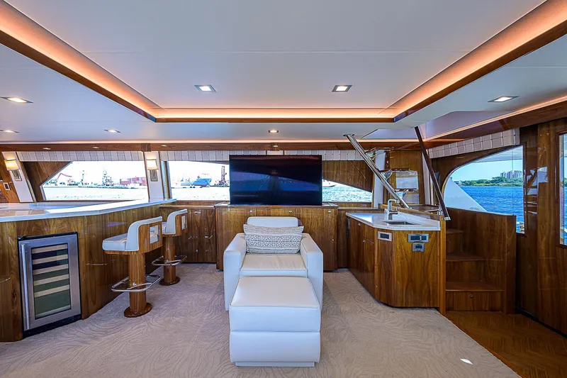 Bella Yacht Photos Pics Luxurious interior of 2018 Viking 92 Sky Bridge yacht with modern amenities and elegant design.