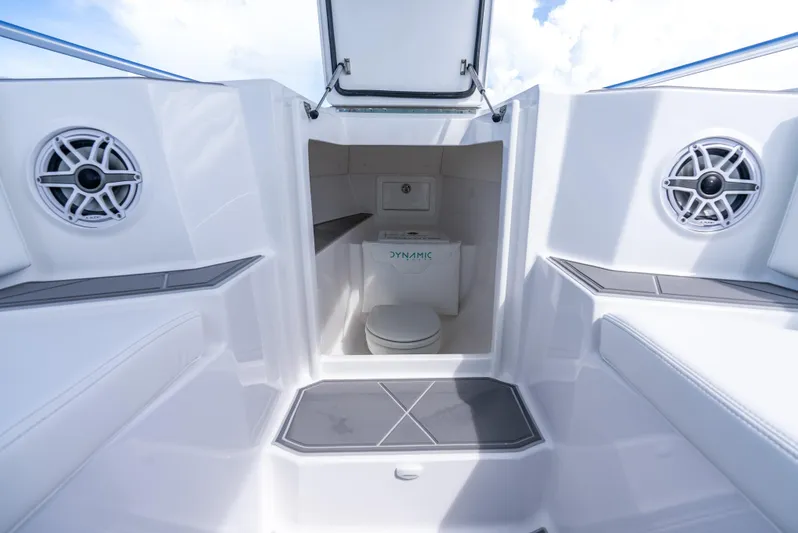  Yacht Photos Pics 2024 Dynamic D-305V boat interior with toilet and speakers.