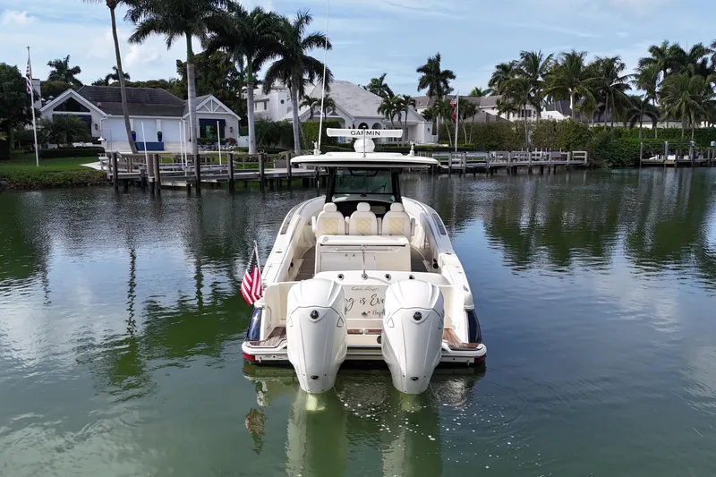  Yacht Photos Pics 2020 Chris-Craft Catalina 34 boat docked in a scenic waterfront setting.
