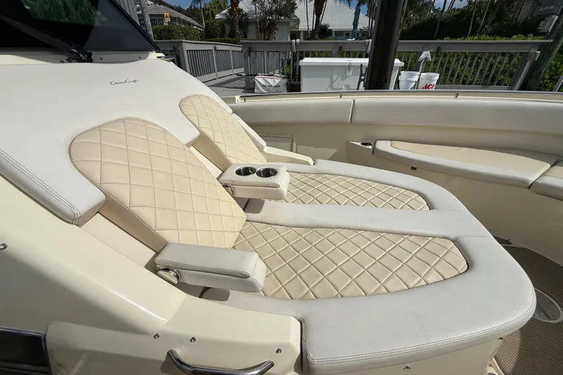  Yacht Photos Pics Luxurious seating on 2020 Chris-Craft Catalina 34 boat with quilted upholstery and cup holders.
