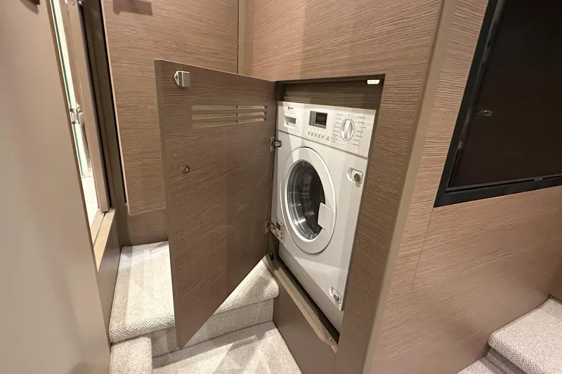 F45079 Yacht Photos Pics Built-in washing machine in 2022 Princess F45 yacht interior.