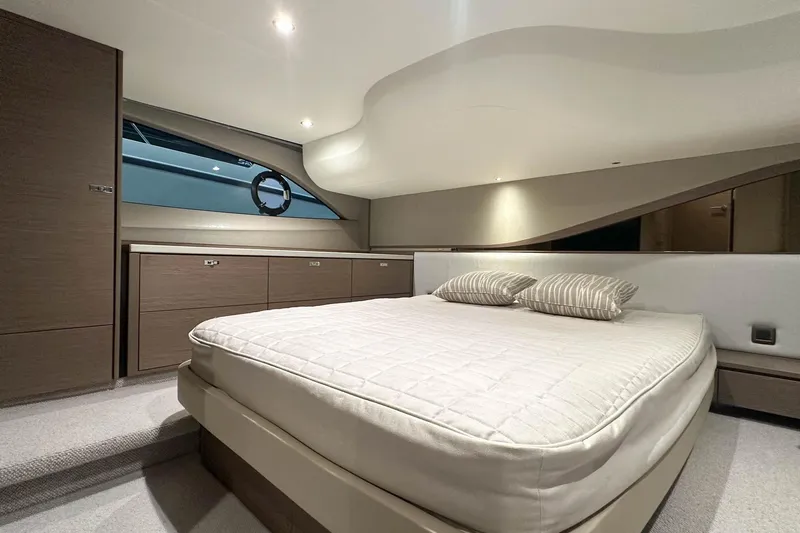F45079 Yacht Photos Pics Luxurious 2022 Princess F45 yacht bedroom with modern design and elegant furnishings.