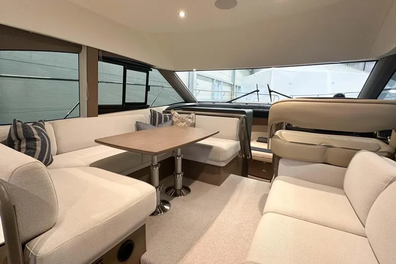 F45079 Yacht Photos Pics Luxurious interior of 2022 Princess F45 yacht with elegant seating and dining area.