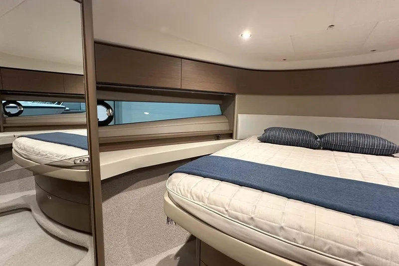 F45079 Yacht Photos Pics Luxurious 2022 Princess F45 yacht bedroom with modern design and elegant bedding.