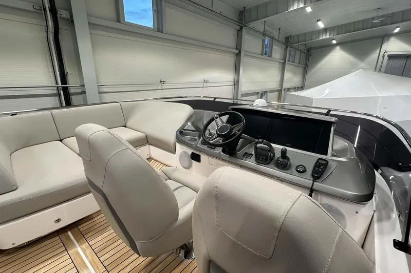 F45079 Yacht Photos Pics Interior of 2022 Princess F45 yacht with modern helm and seating.
