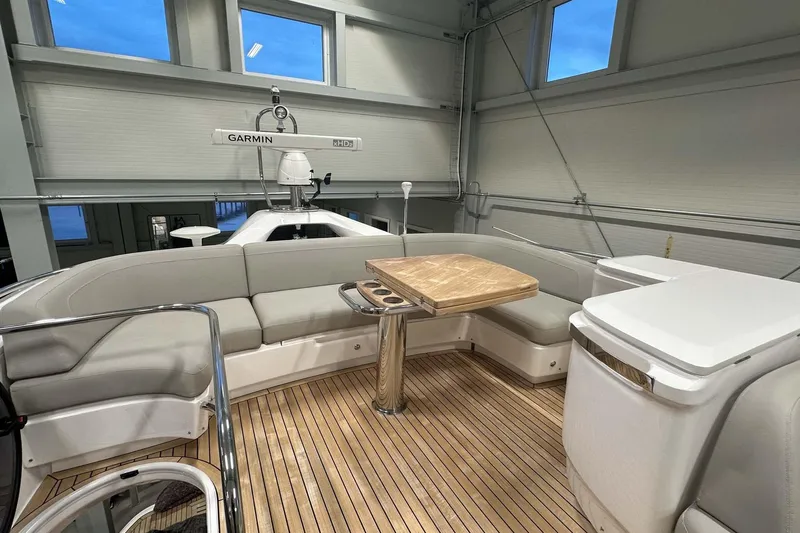 F45079 Yacht Photos Pics Luxurious 2022 Princess F45 yacht interior with elegant seating and wooden table.