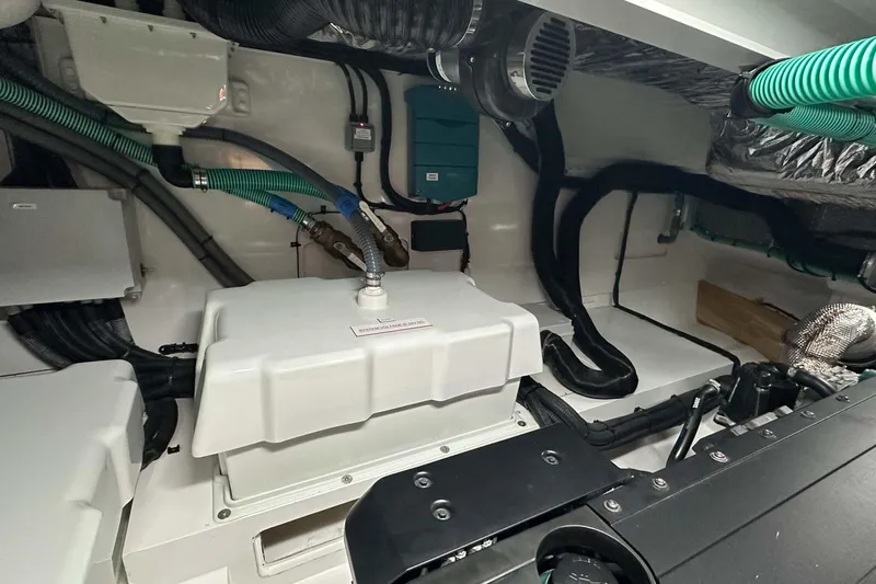 F45079 Yacht Photos Pics Engine room of a 2022 Princess F45 yacht, showcasing mechanical components and wiring.