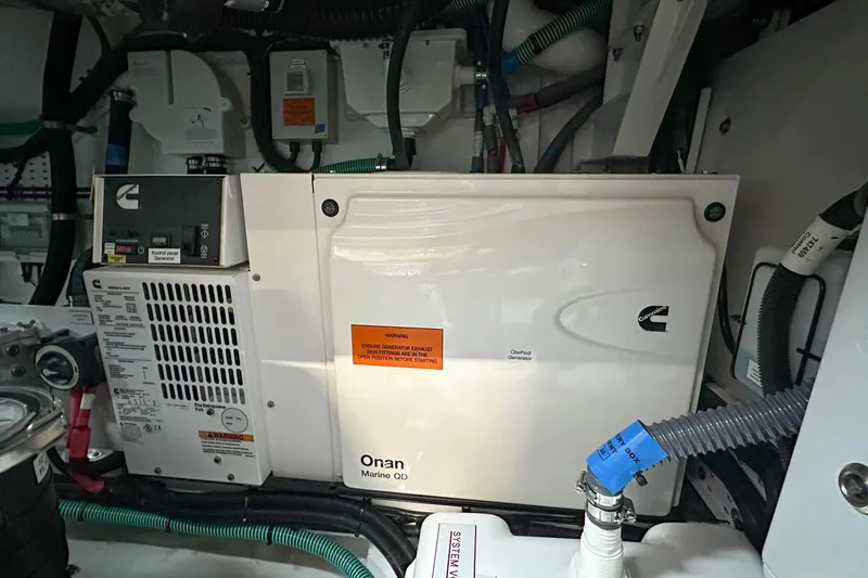 F45079 Yacht Photos Pics Engine room of 2022 Princess F45 yacht with Cummins Onan Marine QD generator.