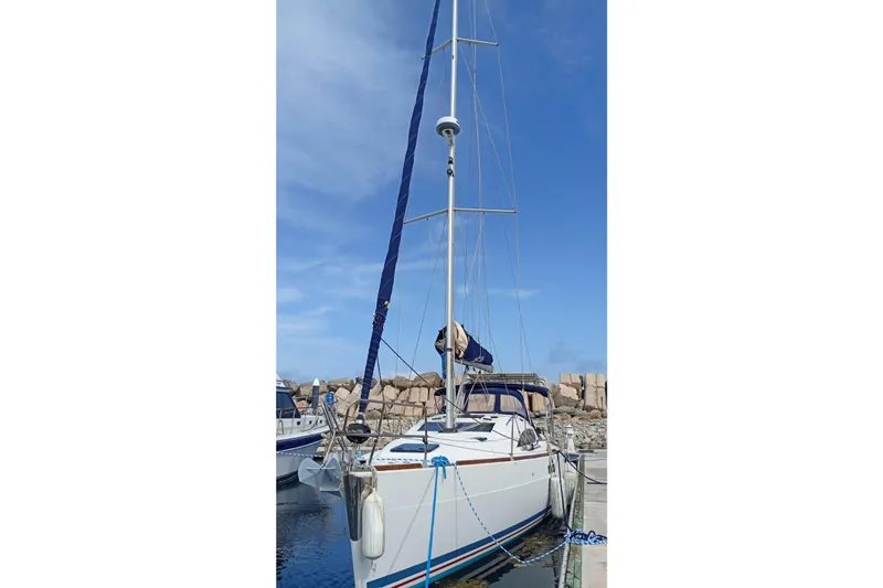  Yacht Photos Pics 2018 Elan Impression 40 sailboat docked at marina under clear blue sky.