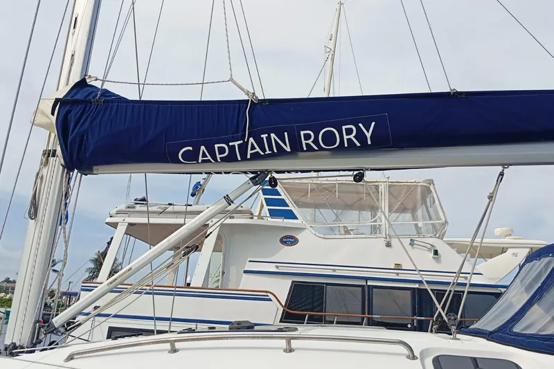  Yacht Photos Pics Sailboat "Captain Rory" with blue cover, Elan Impression 40, 2018 model.