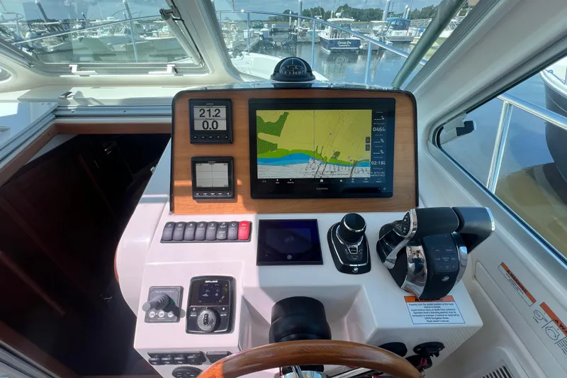  Yacht Photos Pics Helm of 2022 Back Cove 34O with navigation and control systems.