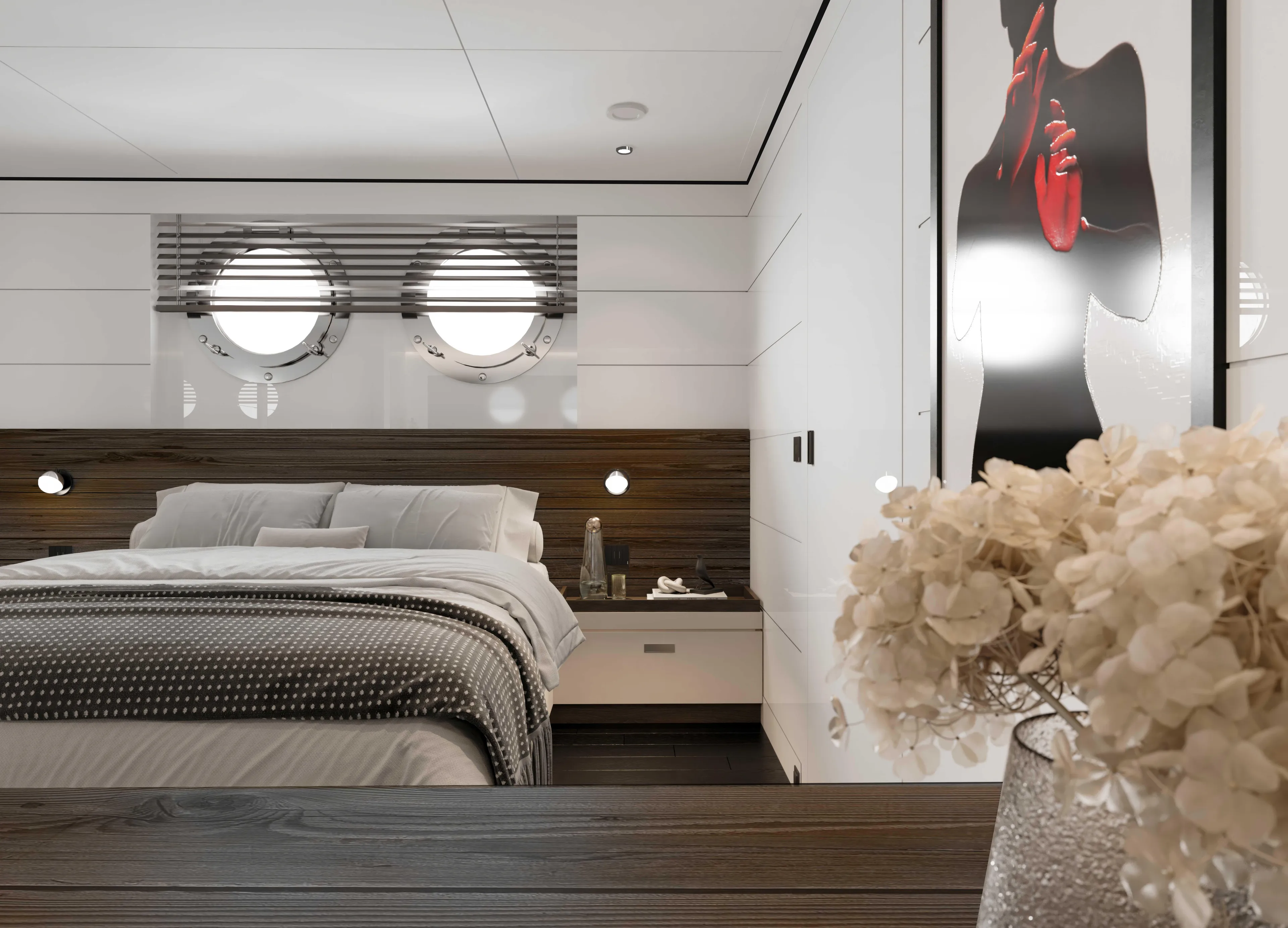  Yacht Photos Pics Luxurious yacht bedroom with modern decor, featuring porthole windows and elegant floral arrangement.