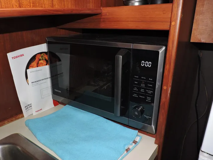 Yacht Photos Pics Microwave in 1990 Post 44 Sport Fisherman boat kitchen with Toshiba manual.