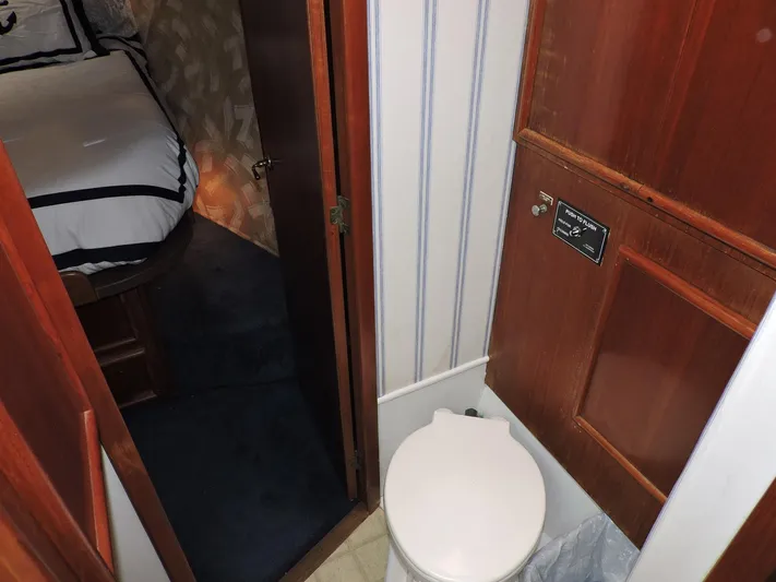  Yacht Photos Pics 1990 Post 44 Sport Fisherman interior with bathroom and bedroom view.