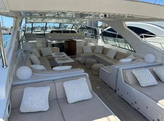  Yacht Photos Pics Luxurious 2006 Mangusta 80 yacht interior with plush seating and elegant design.