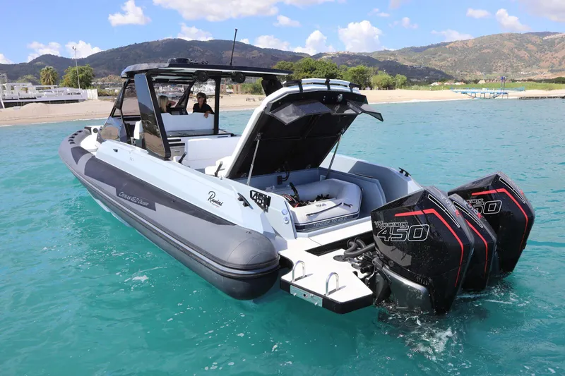  Yacht Photos Pics 2025 Ranieri CAYMAN 45.0 Cruiser on turquoise water, featuring dual outboard engines.