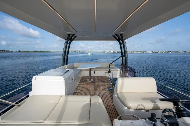 Pamper You Yacht Photos Pics Luxurious 2019 Prestige 460 yacht interior with spacious seating and ocean view.