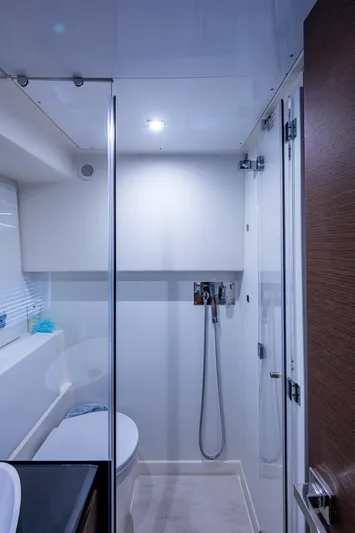 Pamper You Yacht Photos Pics Bathroom interior of a 2019 Prestige 460 yacht, featuring modern fixtures and sleek design.