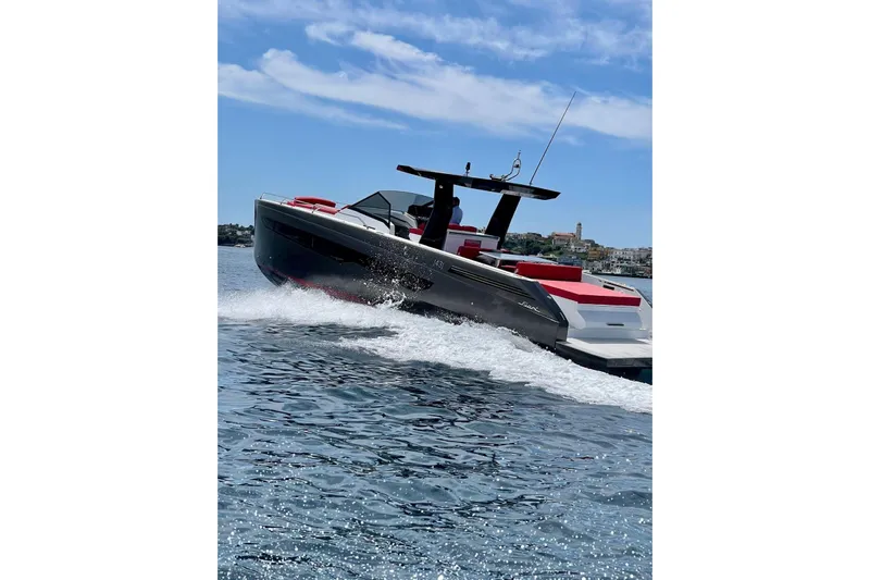  Yacht Photos Pics 2021 Fiart Seawalker 43 cruising on open water under a clear blue sky.