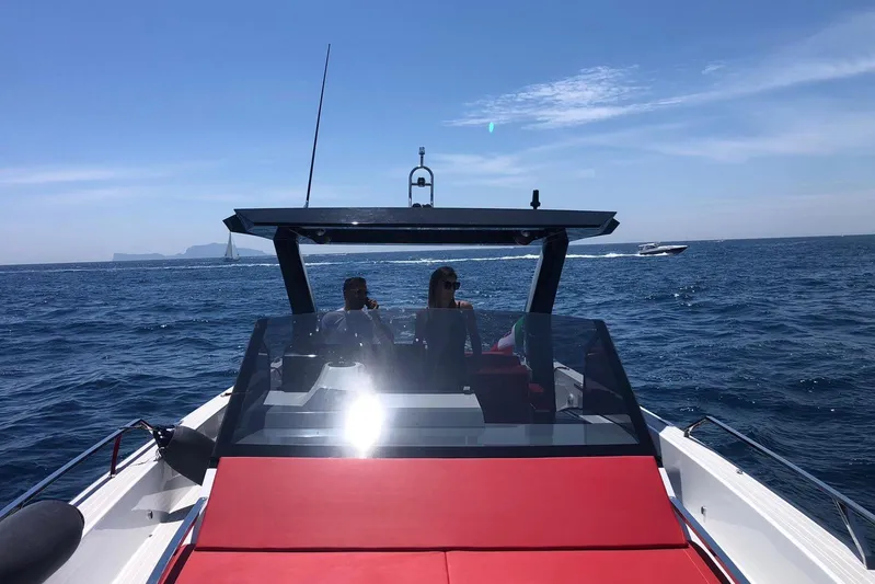  Yacht Photos Pics 2021 Fiart Seawalker 43 yacht cruising on open sea under clear blue sky.