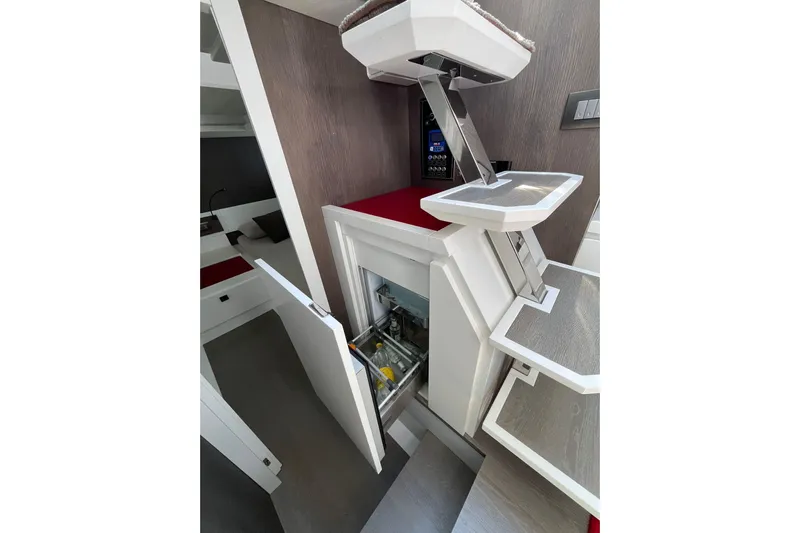  Yacht Photos Pics Interior of 2021 Fiart Seawalker 43 yacht, featuring modern design and built-in storage.