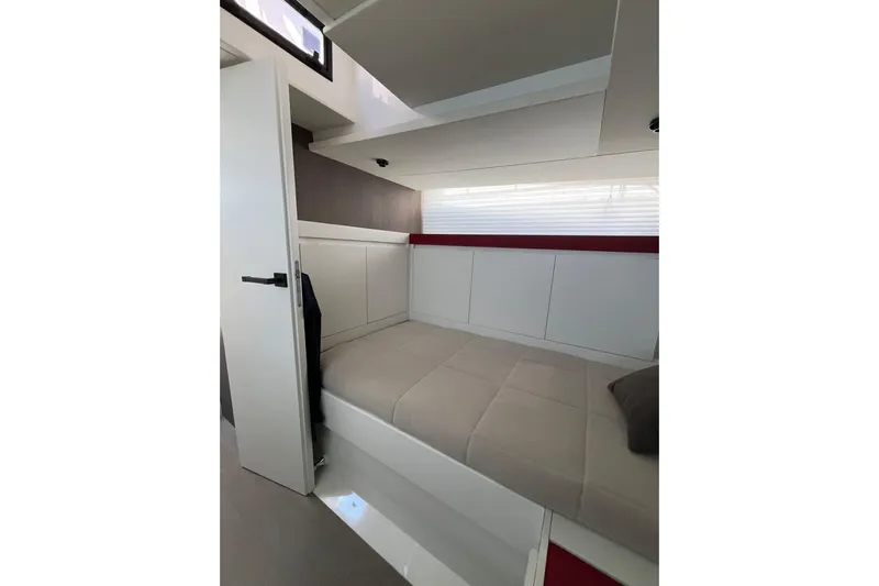  Yacht Photos Pics Interior cabin of 2021 Fiart Seawalker 43 yacht, featuring modern design and comfortable seating.