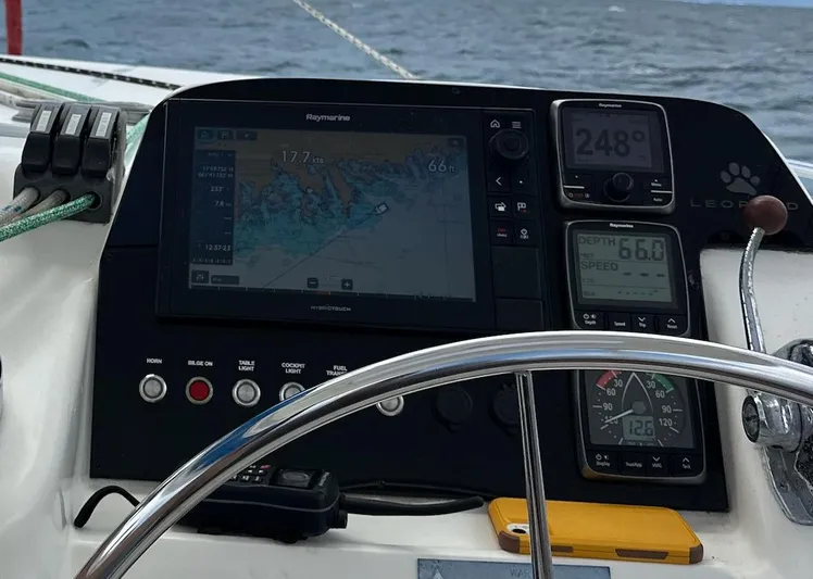 Merry Mac Yacht Photos Pics Sailing dashboard on 2013 Leopard 44 catamaran with navigation and control instruments.
