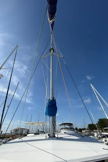 Merry Mac Yacht Photos Pics 2013 Leopard 44 sailboat mast and rigging under clear blue sky.