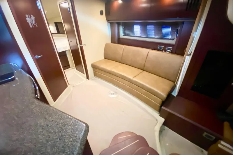  Yacht Photos Pics 2007 Sea Ray 38 Sundancer interior with leather seating and modern amenities.