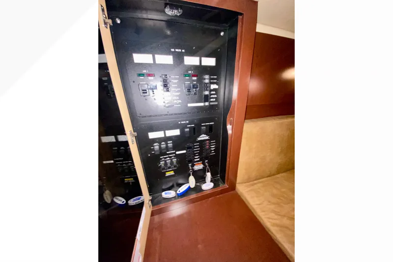  Yacht Photos Pics Electrical panel inside 2007 Sea Ray 38 Sundancer yacht, featuring control switches and indicators.