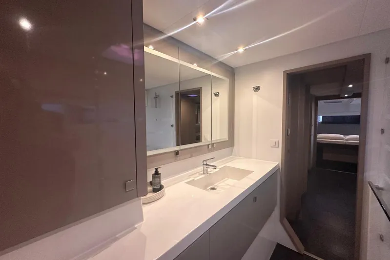  Yacht Photos Pics Modern bathroom interior of 2020 Fountaine Pajot Saona 47 yacht with sleek design.