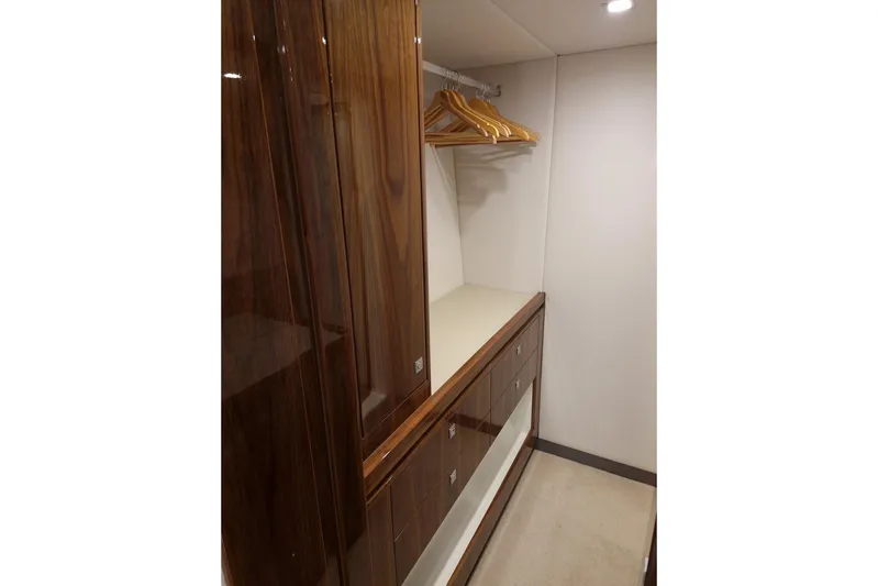 Mon Trésor Yacht Photos Pics Luxurious wooden closet interior in 2020 Riviera 6000 Sport Yacht Platinum Edition.