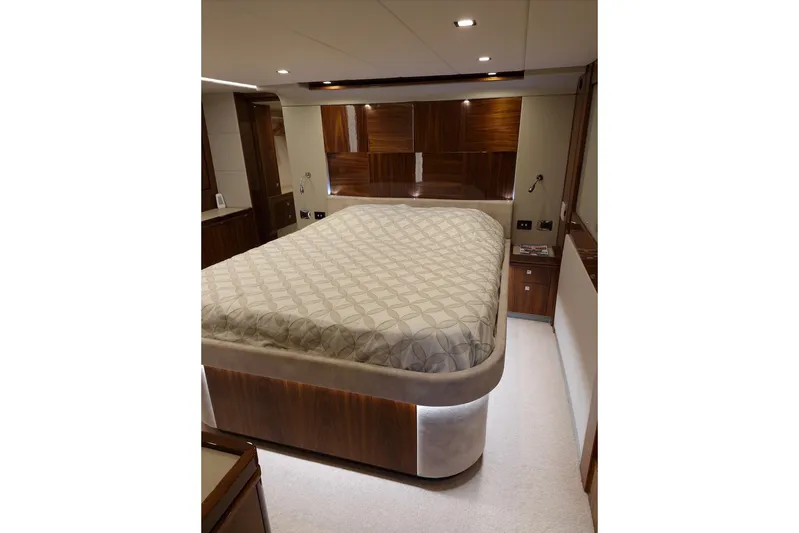 Mon Trésor Yacht Photos Pics Luxurious bedroom interior of 2020 Riviera 6000 Sport Yacht Platinum Edition.