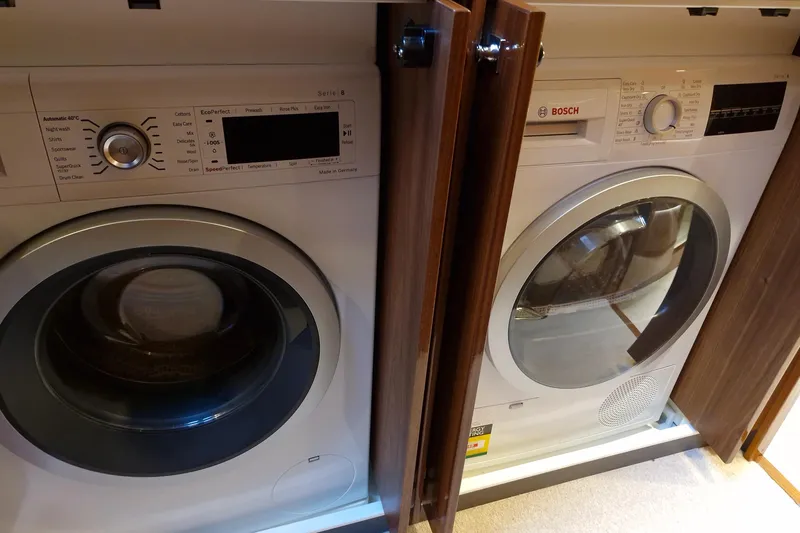 Mon Trésor Yacht Photos Pics Bosch washer and dryer in Riviera 6000 Sport Yacht Platinum Edition, 2020 model.