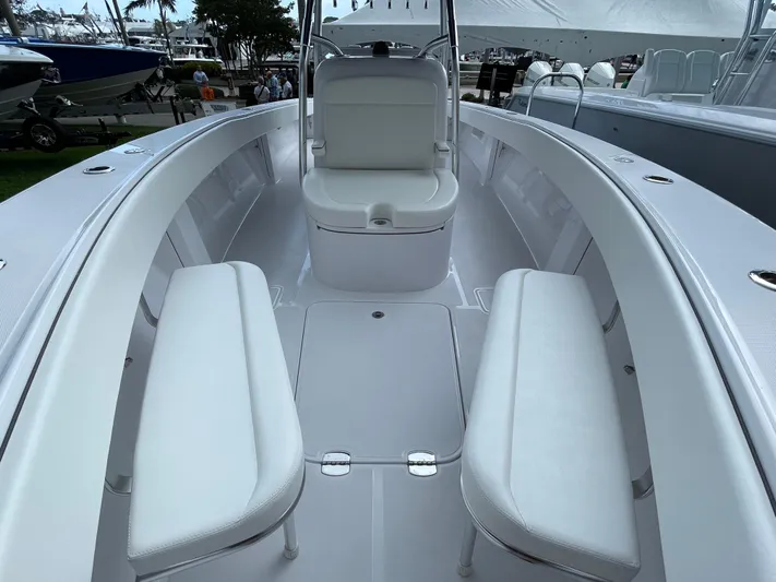 Reel Chaos Yacht Photos Pics 2022 Bahama 35 Open boat interior with white seating and sleek design.