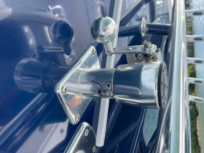 Reel Chaos Yacht Photos Pics Close-up of a 2022 Bahama 35 Open boat's metal fitting and handle.