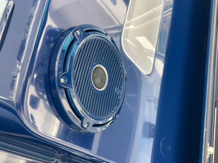 Reel Chaos Yacht Photos Pics Close-up of a blue speaker on a 2022 Bahama 35 Open boat.