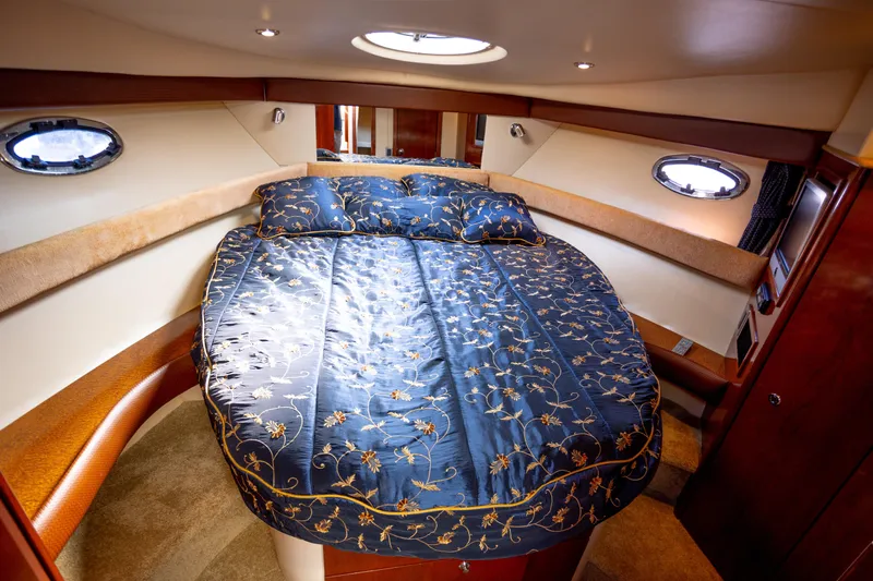 Seacougs Yacht Photos Pics Luxurious cabin interior of 2008 Meridian 341 Sedan yacht with elegant bedding.