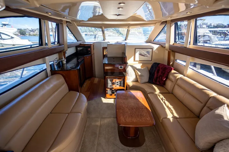 Seacougs Yacht Photos Pics Luxurious interior of 2008 Meridian 341 Sedan yacht with plush seating and elegant decor.