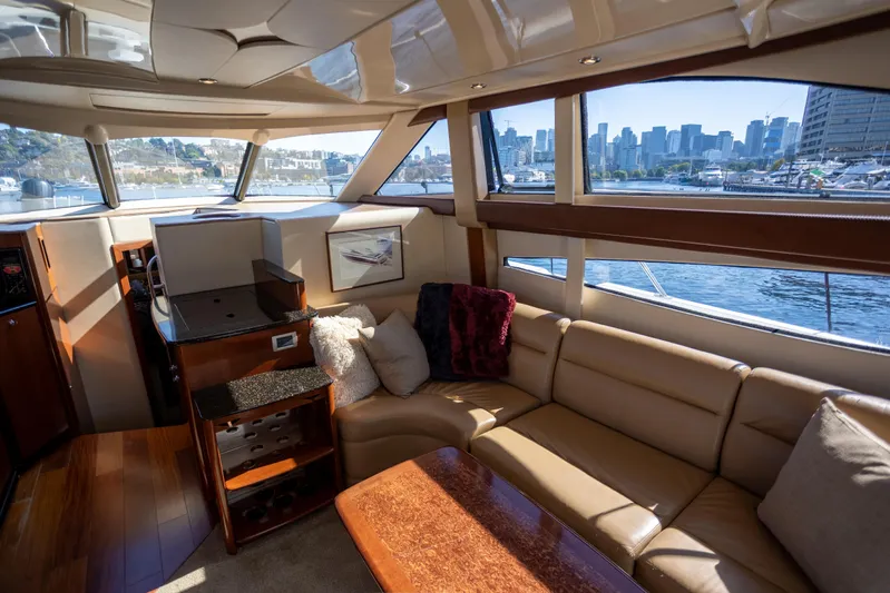 Seacougs Yacht Photos Pics Luxurious interior of 2008 Meridian 341 Sedan yacht with city skyline view.