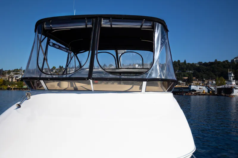 Seacougs Yacht Photos Pics 2008 Meridian 341 Sedan boat on water, clear sky, marina background.