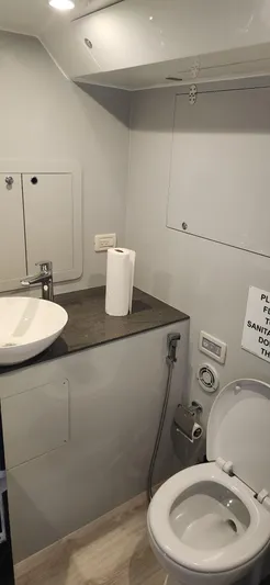 Catch And Release Yacht Photos Pics Modern Trident Custom 2017 bathroom with sink, toilet, and countertop in a compact space.