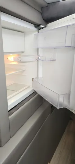 Catch And Release Yacht Photos Pics Open Trident Custom refrigerator, 2017 model, with empty shelves and door compartments.