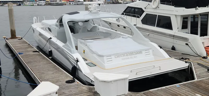 Catch And Release Yacht Photos Pics Luxurious 2017 Trident Custom yacht docked at marina, sleek design, spacious deck.